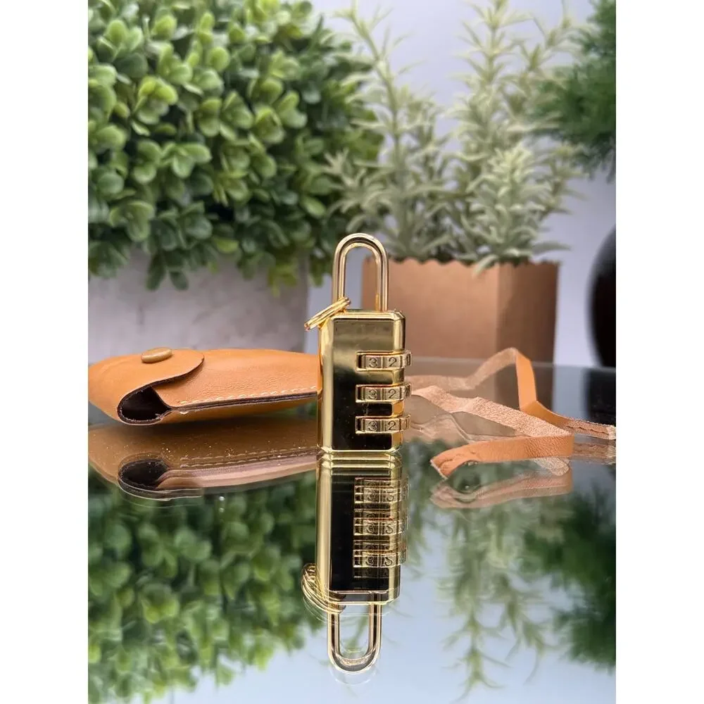 Gucci Gold Tone three-dial combination lock padlock with case & COA